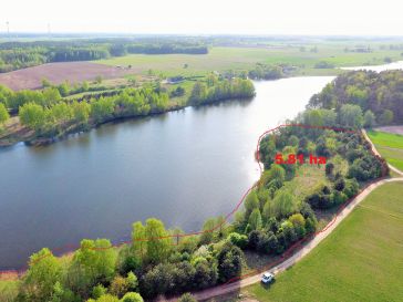  IŠSKIRTINIO GROŽIO ŽEMĖS SKLYPAS ANT RAMUČIŲ TVENKINIO KRANTO