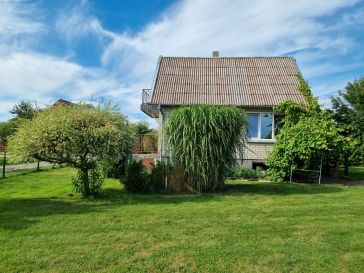 PARDUODAMAS SODO NAMAS SU ŪKINIU PASTATU IR 12.59 ARŲ ŽEMĖS SKLYPU70